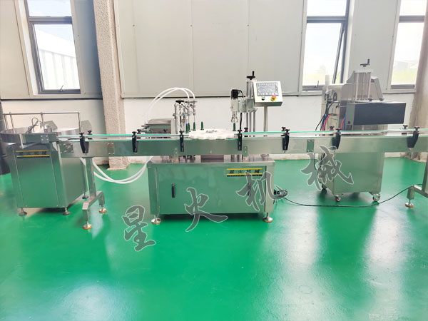 玻璃清洗剂灌装旋盖铝箔封口贴标流水线